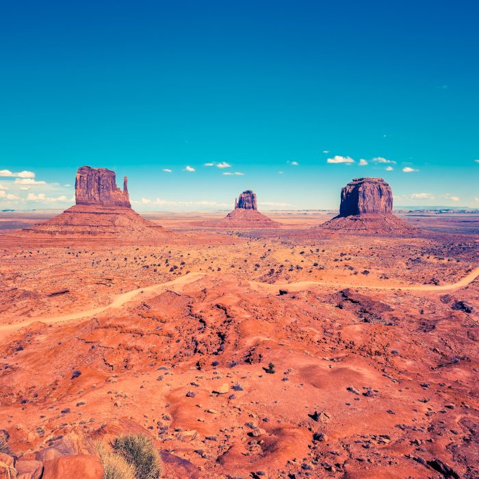 Monument valley under blue sky, USA.